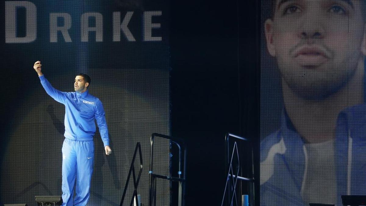 Kentucky fan and hip hop star Drake speaks to fans during the team's NCAA college basketball Big Blue Madness, Friday, Oct. 17, 2014, in Lexington, Ky.