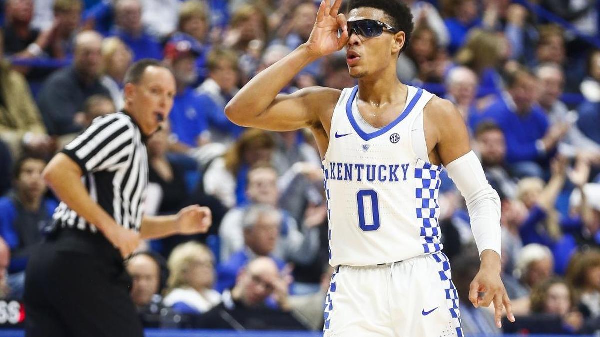 Kentucky guard Quade Green reacted after a three-point basket Saturday. Green was wearing glasses to protect an eye injury suffered last weekend.