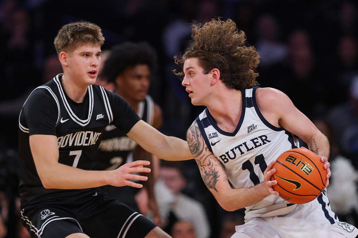 Butler guard Finley Bizjack drives against Providence’s Stefan Vaaks during the Big East Tournament. Both players will be in the transfer portal this spring.