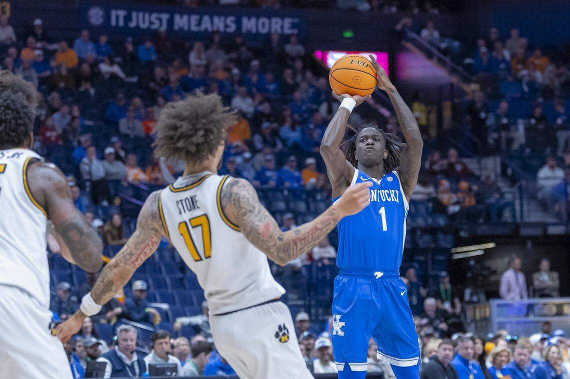 Kentucky Wildcats guard Denzel Aberdeen (1) shoots the ball over Missouri Tigers guard Jayden Stone (17) during the SEC Tournament at Bridgestone Arena on Thursday.