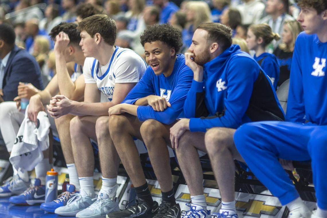 Kentucky Wildcats forward Braydon Hawthorne (22) smiles as he watches his team play during a game against the Mississippi Rebels at Rupp Arena in Lexington, Ky., on Saturday, Jan. 24, 2026.  