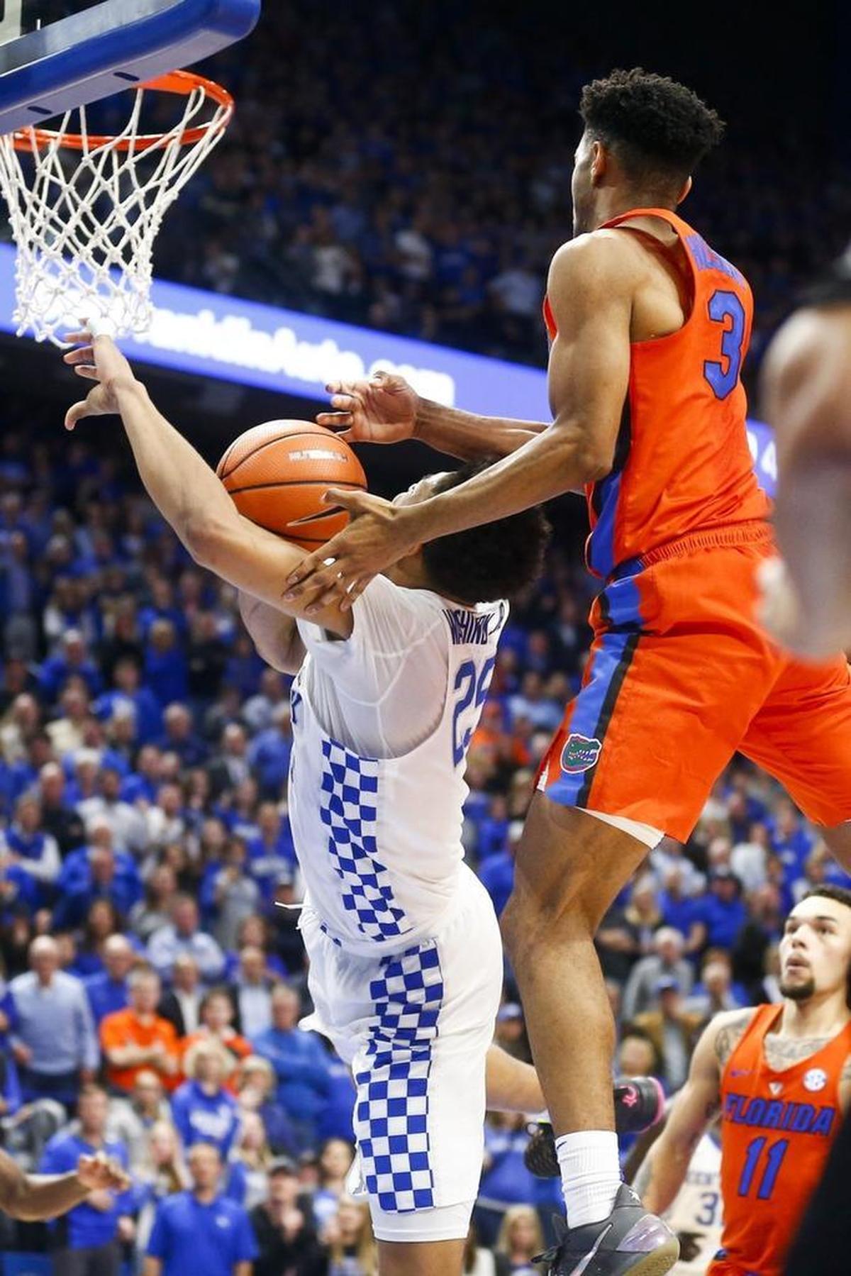 Florida guard Jalen Hudson blocked Kentucky forward PJ Washington late in the second half in Rupp Arena on Jan. 20. Kentucky Coach John Calipari and Big Blue Nation thought a foul should have been called on the play.