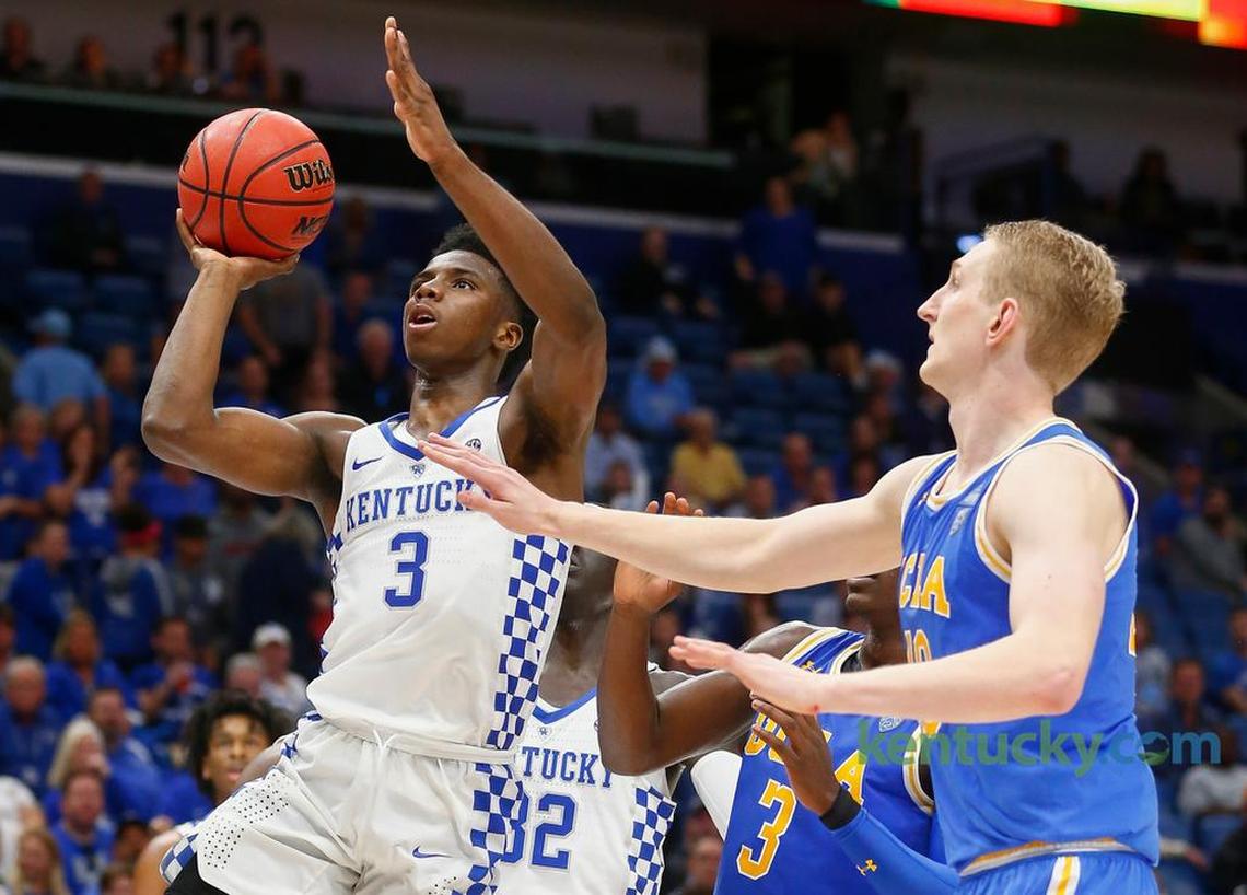 Kentucky’s Hamidou Diallo (3) went to the basket against UCLA’s Aaron Holiday (3) and Thomas Welsh (40) during the 2017-18 CBS Sports Classic at the Smoothie King Center in New Orleans.