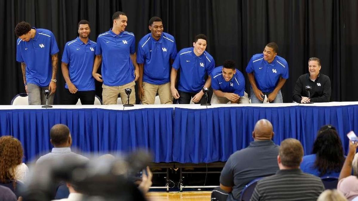 Dakari Johnson, fourth from left, was one of seven 2014-15 Kentucky Wildcats men’s basketball players who turned pro early.