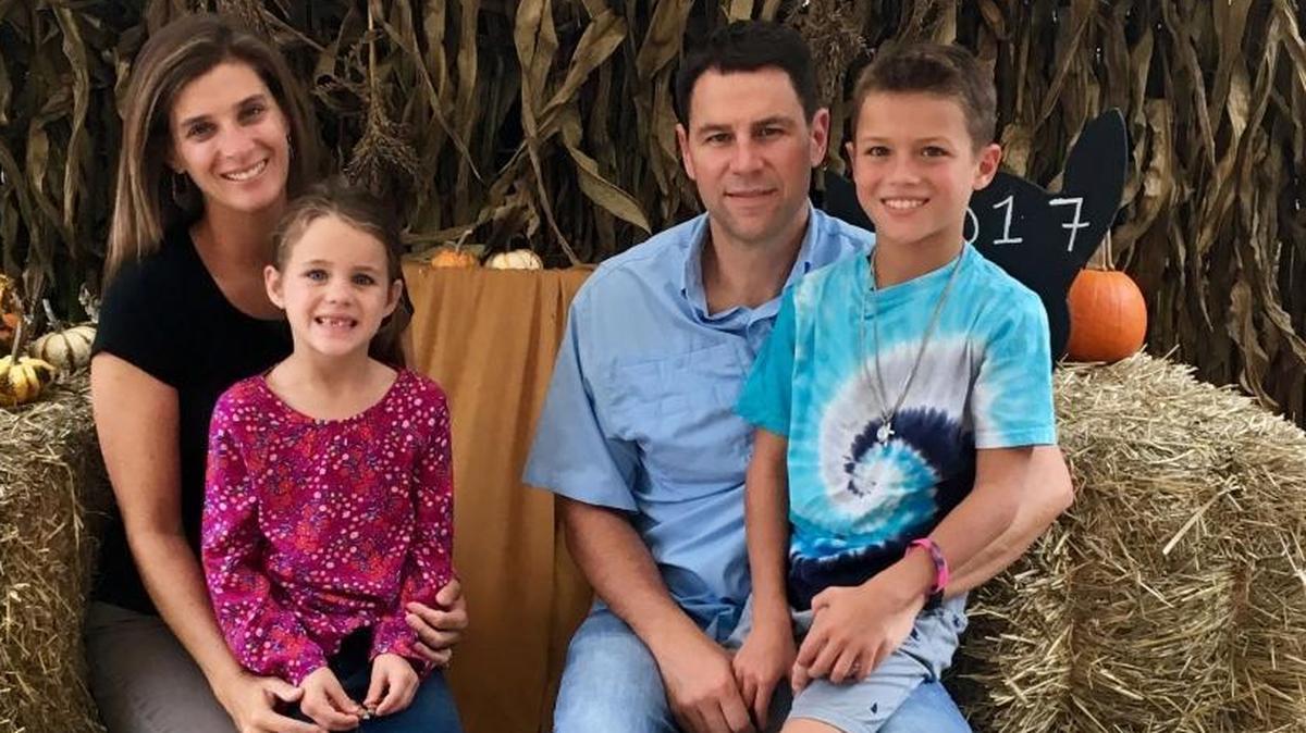 Fort Wayne head coach Jon Coffman with his wife, Tracy, son Tommy and daughter Lucy.