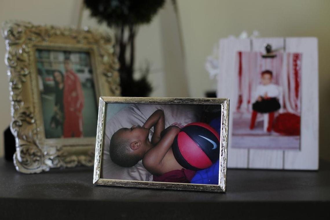 A family photo shows Emoni Bates sleeping with a basketball in Superior Township, Mich., July 21, 2017. The Bates family has agreed to provide The Associated Press with a rare, behind-the-scenes look at the life of one of the most coveted basketball prospects in the country for at least the next five years. The periodic series will include video, photos, audio and text updates to track his progress.