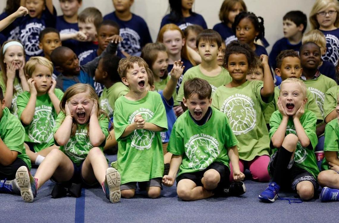 The students cheered during one of the games as several members of the University of Kentucky men's basketball team made a visit to Picadome Elementary School, 1642 Harrodsburg Rd., in Lexington, Ky., Friday, September 15, 2017. Players delivered packed lunches to the school as part of the UK Athletics' God's Pantry program and then participated in various physical education activities and games with the students.