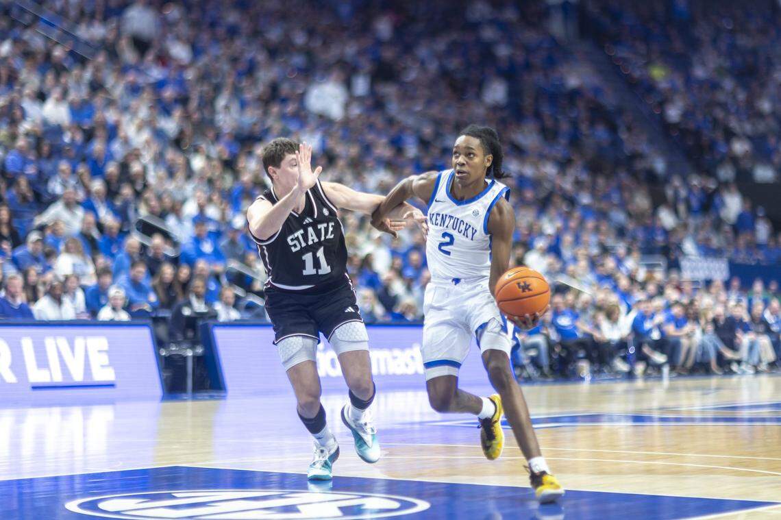 Kentucky guard Jasper Johnson drives the ball past Mississippi State forward Sergej Macura during the Wildcats’ 92-68 victory Saturday night.