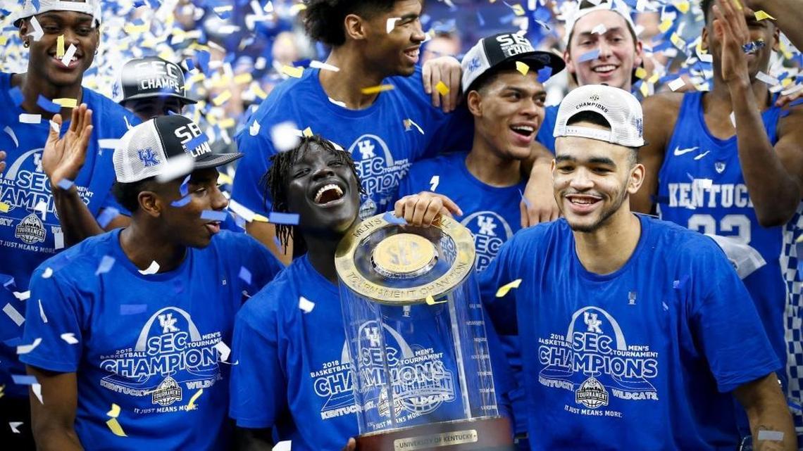 The Kentucky Wildcats celebrated after defeating the Tennessee Volunteers in the the SEC Tournament championship game in St. Louis.