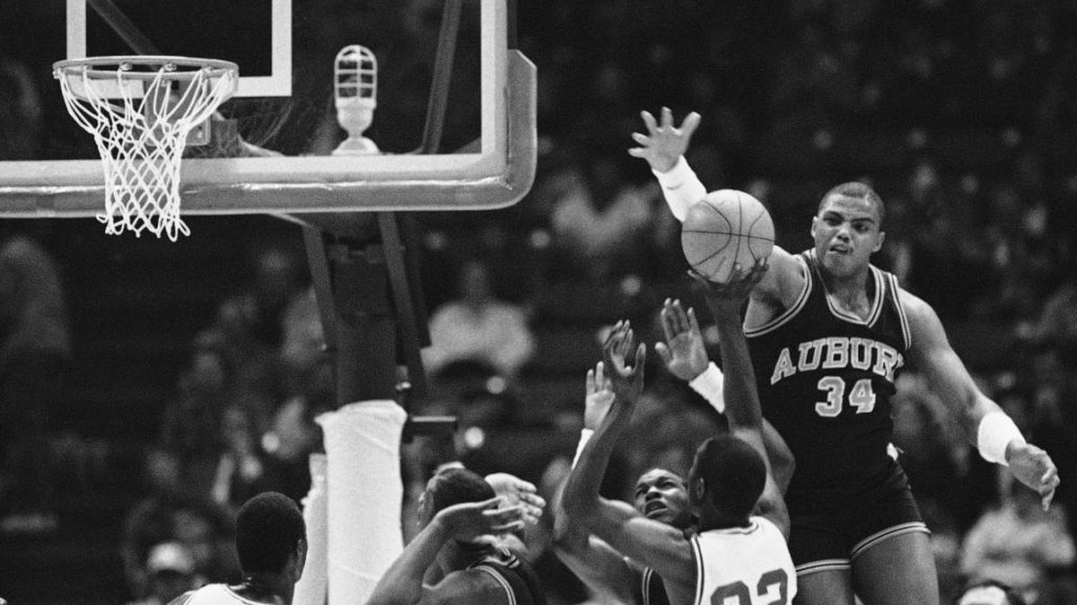 Auburn’s Charles Barkley, right, leaped to block a shot by Alabama’s Buck Johnson during the 1983 Southeastern Conference Tournament in Birmingham. To promote men’s basketball in the conference, a sports marketing director suggested the league should tout its rich history, which includes stars like Barkley (Auburn), Dominique Wilkins (Georgia) and Shaquille O’Neal (LSU).