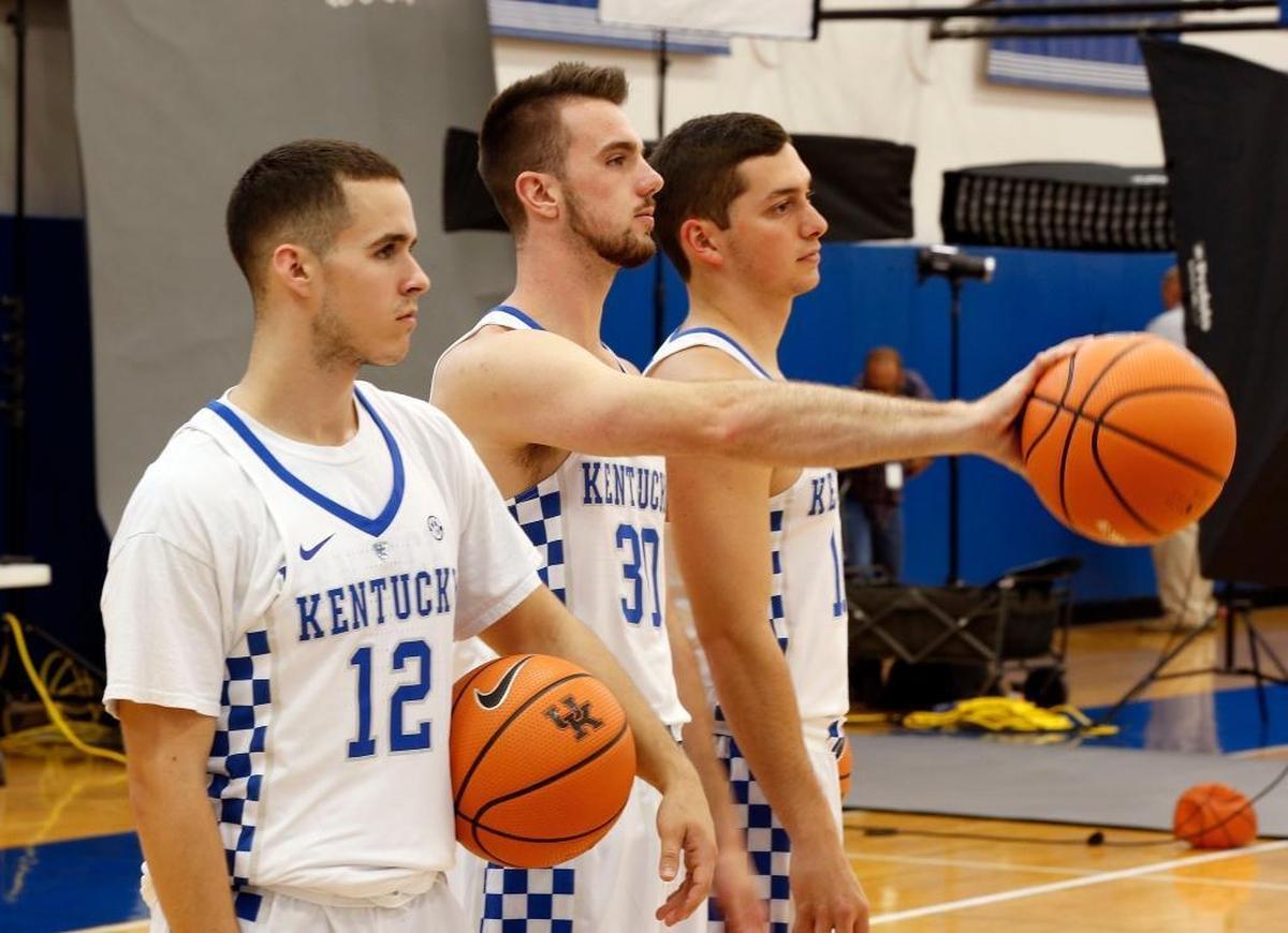 Brad Calipari, left, Dillon Pulliam and Jonny David, right, posed for photos during one of the team’s picture days this fall.