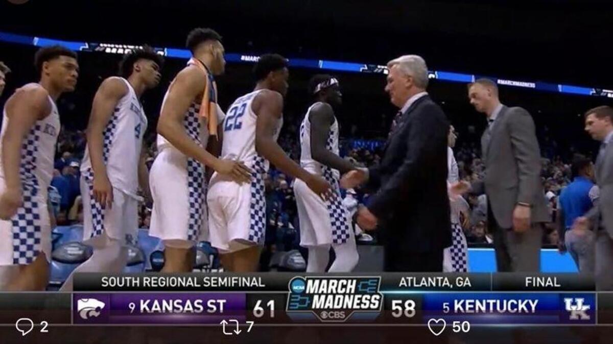 A screen shot from the CBS television broadcast of Thursday night’s game shows Kentucky players lining up to shake hands after the loss to Kansas State.