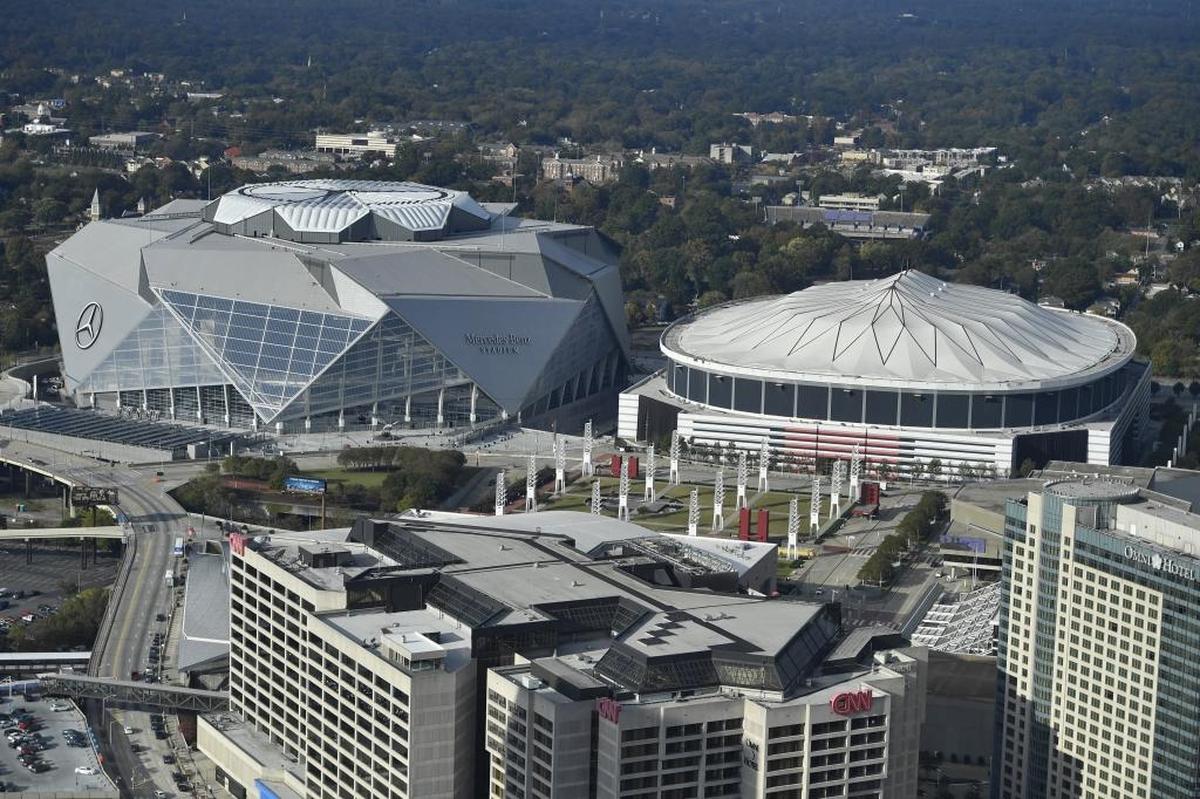 The Georgia Dome is seen at right with the new Mercedes-Benz Stadium at left on Nov. 1, 2017, in Atlanta. The Georgia Dome will be imploded Monday, Nov. 20.