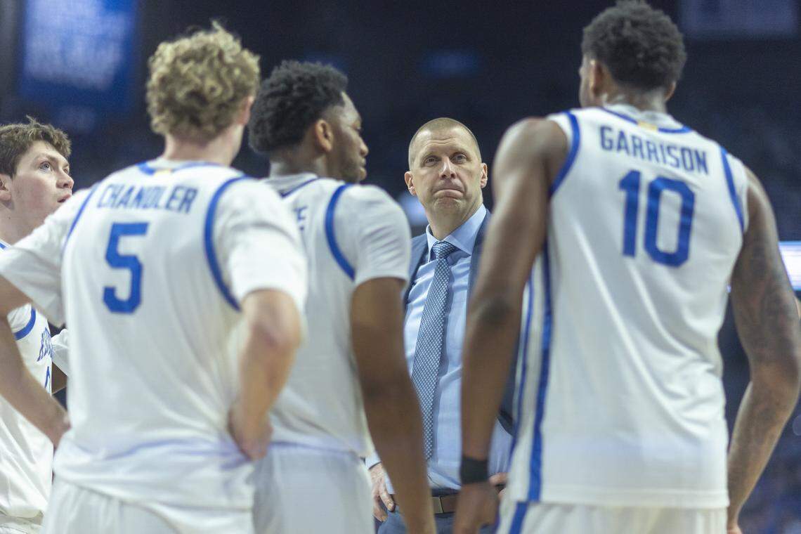 Kentucky head coach Mark Pope talks with his team during a timeout in a game against Oklahoma at Rupp Arena on Feb. 4.