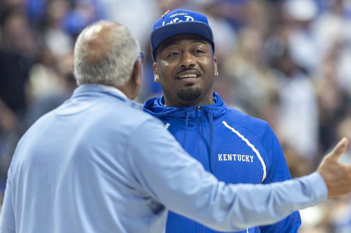 Former Kentucky coach Tubby Smith, left, and former player John Wall talk during Big Blue Madness at Rupp Arena in Lexington, Ky., on Saturday, Oct. 11, 2025.