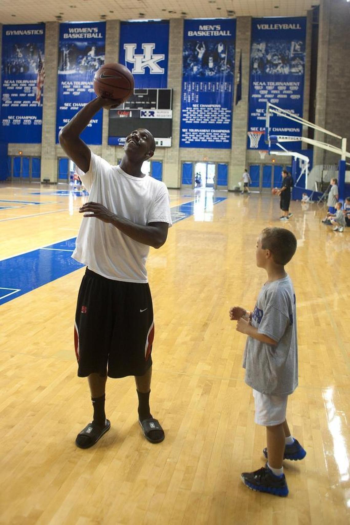 Former Wildcats point guard Marquis Teague helped work a camp for children at UK in 2012.