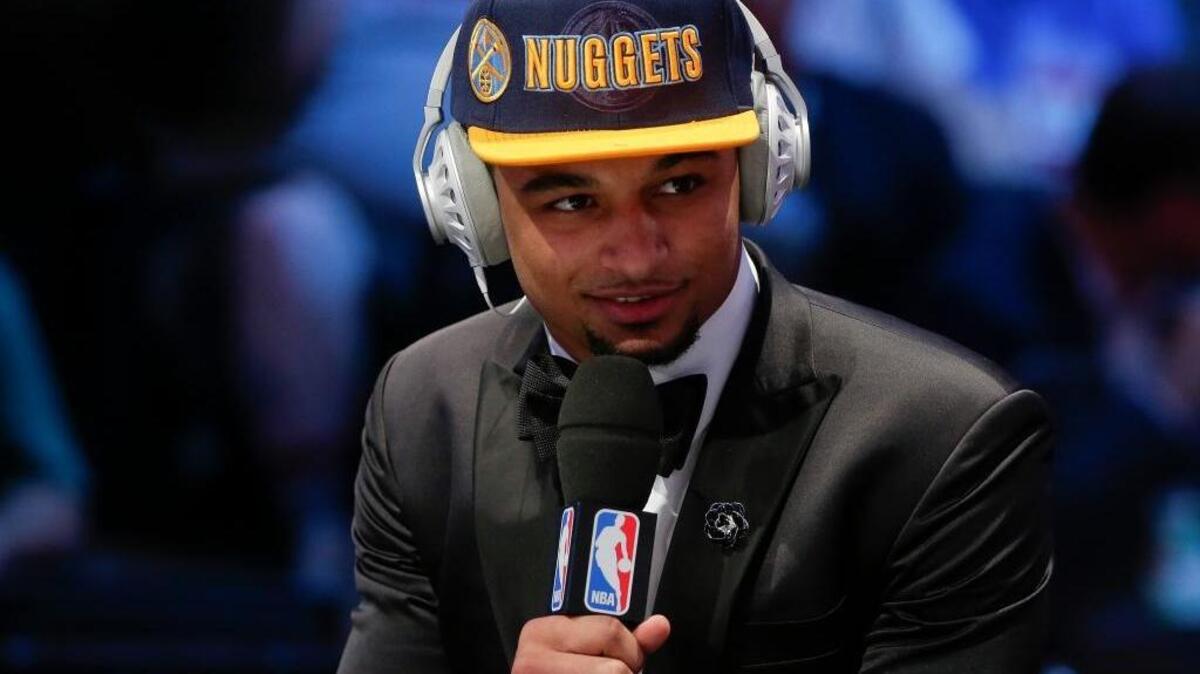 Jamal Murray answers questions during an interview after being selected seventh overall by the Denver Nuggets during the NBA basketball draft, Thursday, June 23, 2016, in New York.