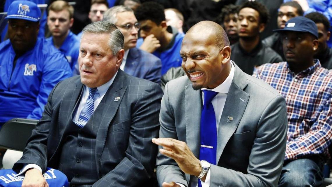Memphis athletic director Tom Bowen, left, and new Memphis basketball coach Penny Hardaway attend a news conference Tuesday.
