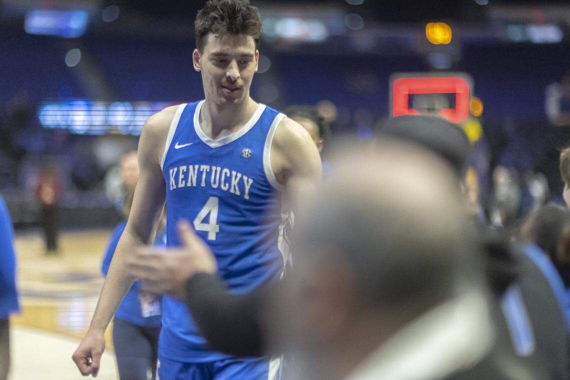 Kentucky basketball forward Andrija Jelavic (4) greets fans as he walks off the court following a win over LSU at the Pete Maravich Assembly Center in Baton Rouge, Louisiana, on Wednesday.