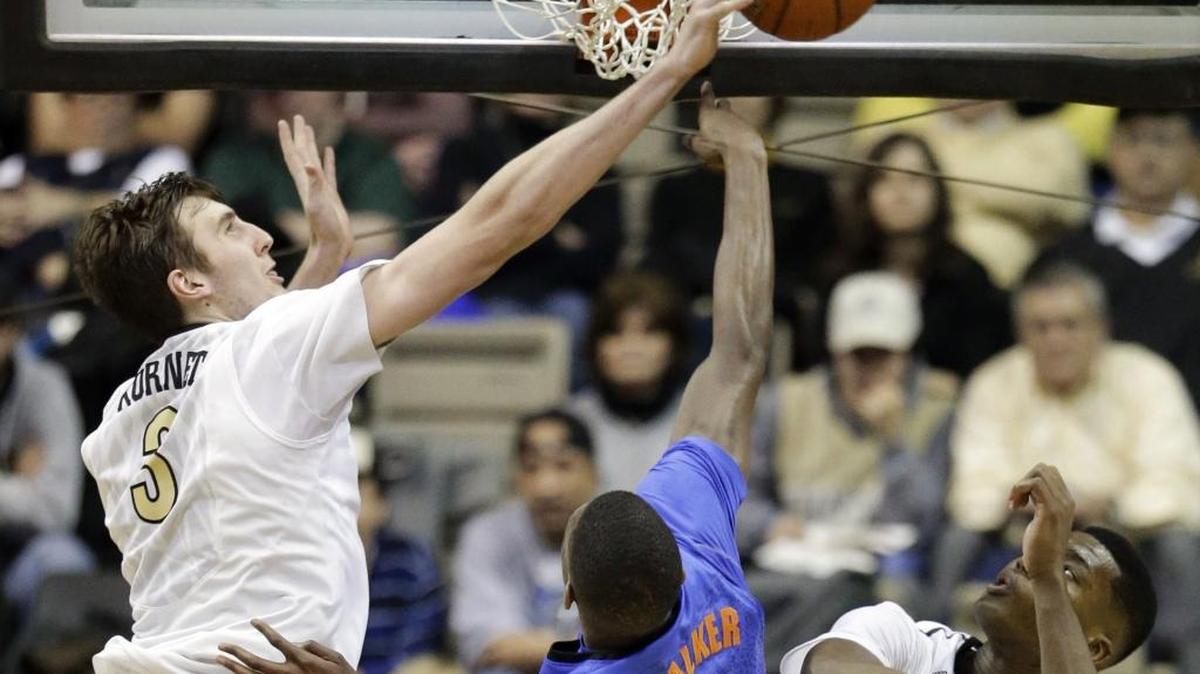 Vanderbilt forward Luke Kornet (3) blocks a shot by Florida’s DeVon Walker (1) in the second half of an NCAA college basketball game Tuesday, Jan. 26, 2016, in Nashville, Tenn. Also defending for Vanderbilt is Damian Jones (30). Vanderbilt won 60-59.