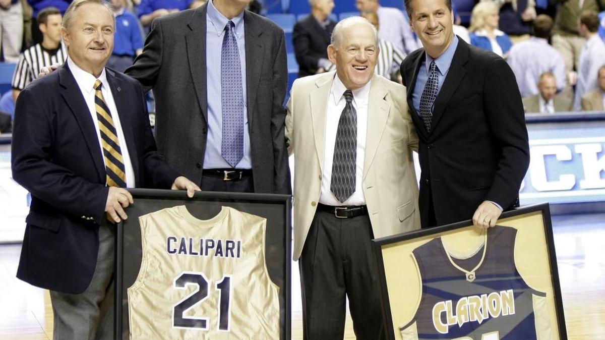 Kentucky head coach John Calipari was presented a jersey by a group from Clarion when the teams met in Rupp Arena in 2009, Calipari’s first season at UK. Left to right were Calipari’s high school coach, Bill Sacco, then-Clarion coach Ron Righter, Calipari’s coach at Clarion, Joe DeGregorio, and Calipari.