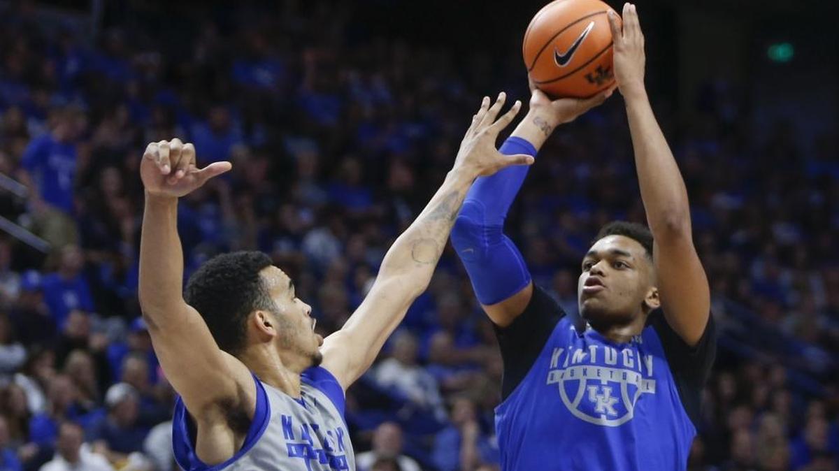 Freshman forward PJ Washington put up a jumper over sophomore forward Sacha Killeya-Jones during the Blue-White Game in Rupp Arena on Friday night.