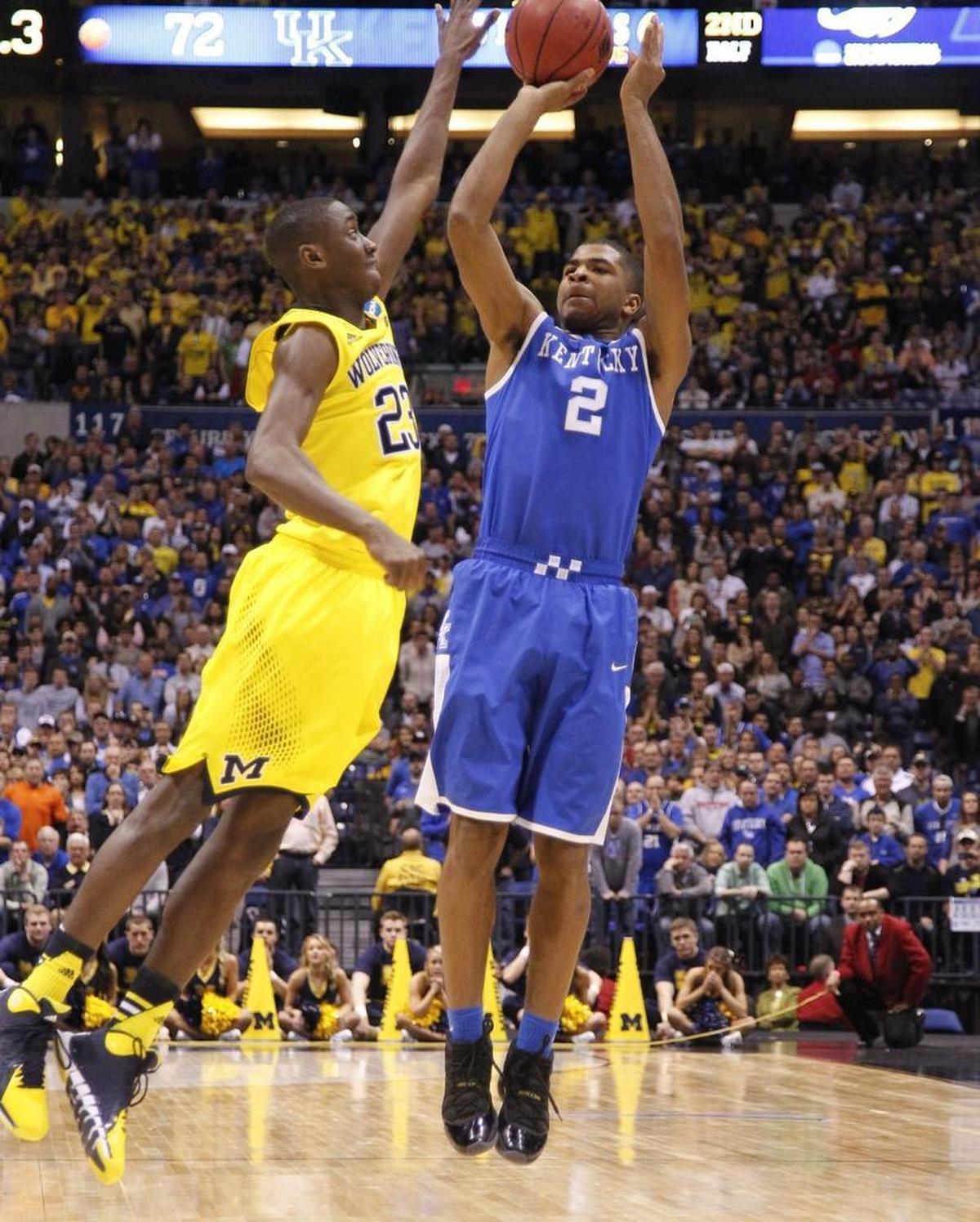 Aaron Harrison hit several big shots for UK, including this one against Michigan in the 2014 Elite Eight.