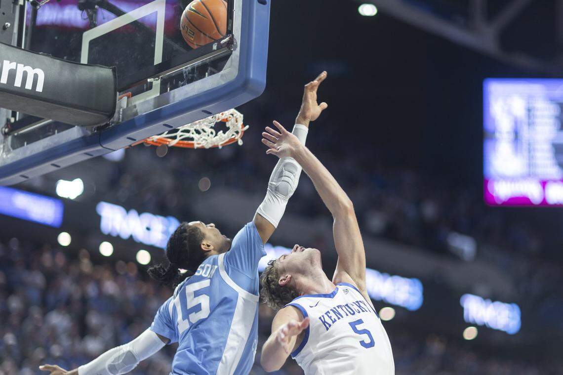 Kentucky guard Collin Chandler (5) misses a basket as North Carolina forward Jarin Stevenson (15) defends in the final seconds of a game at Rupp Arena on Tuesday.