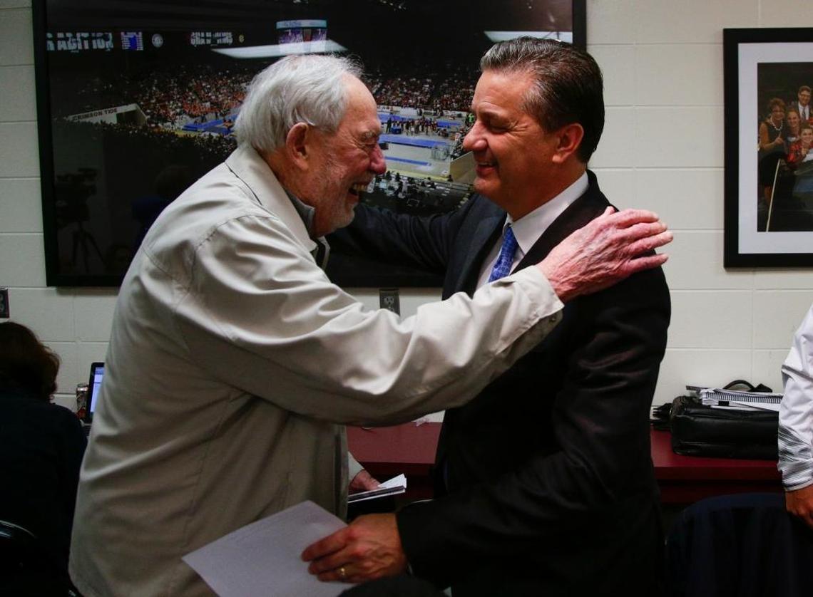 Kentucky Coach John Calipari got a surprise visit from C.M. Newton during the press conference after the Cats defeated Alabama 77-61 on Jan. 9, 2016, in Tuscaloosa, Ala.
