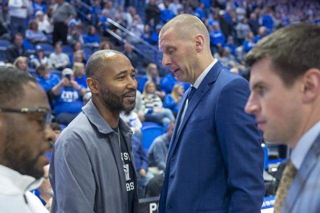 Kentucky head coach Mark Pope, right, speaks with Jackson State head coach Mo Williams before a game at Rupp Arena on Nov. 22, 2024.
