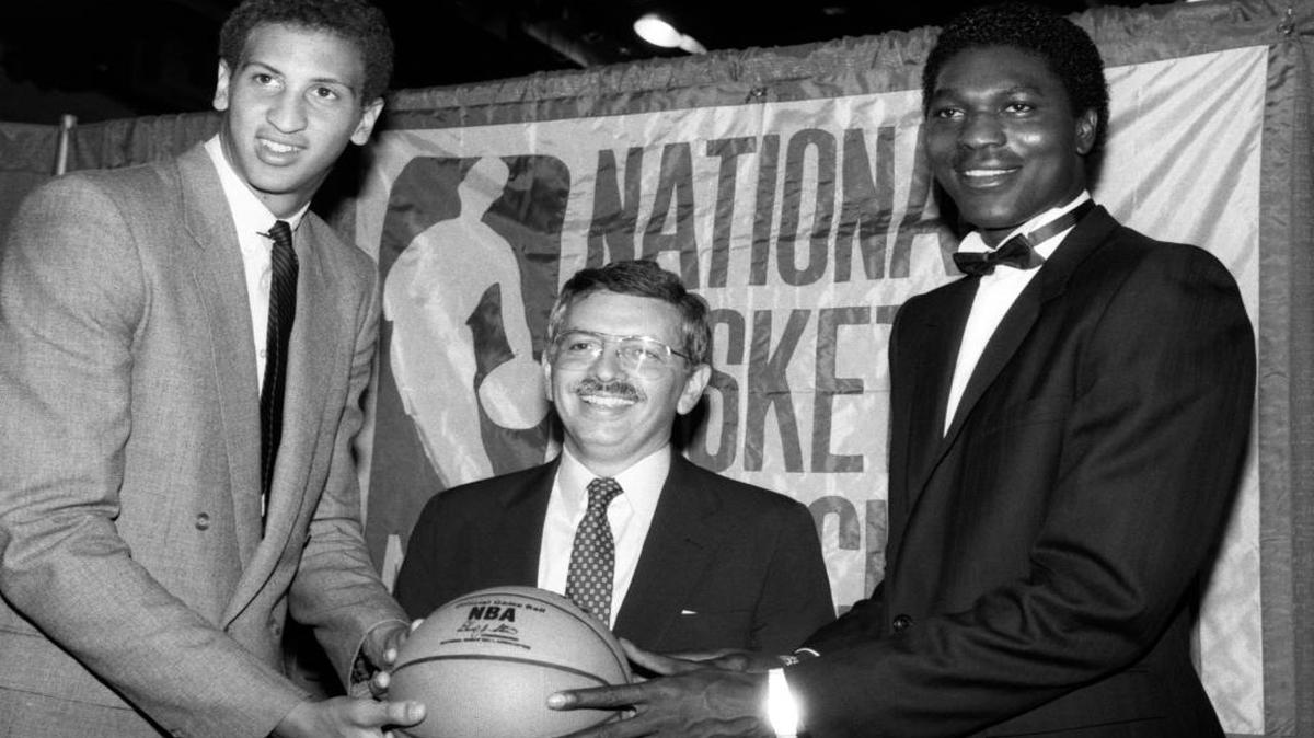 NBA commissioner David Stern, center, was flanked by Akeem Olajuwon, right, the No. 1 pick overall by the Houston Rockets, and Sam Bowie, the No. 2 pick overall by the Portland Trail Blazers at the NBA Draft in New York on June 19, 1984.