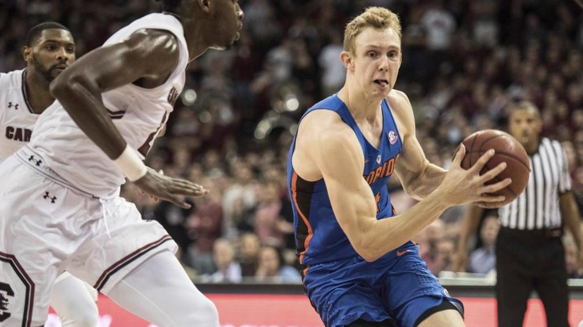 Canyon Barry, right, is a graduate transfer playing his final season for Florida. He previously played three seasons at the College of Charleston.