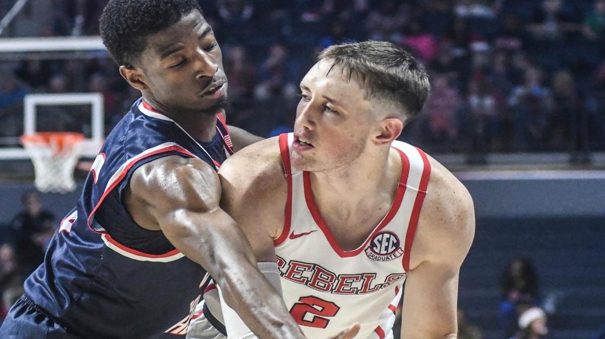 Mississippi guard Cullen Neal (2) was defended by South Alabama guard Dederick Lee on Dec. 22 in Oxford, Miss.