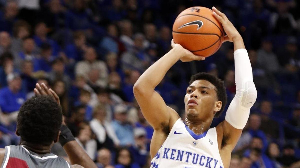 Kentucky's Quade Green (0) shoots while defended by Troy's Jordon Varnado (23) during the second half of an NCAA college basketball game, Monday, Nov. 20, 2017, in Lexington, Ky.