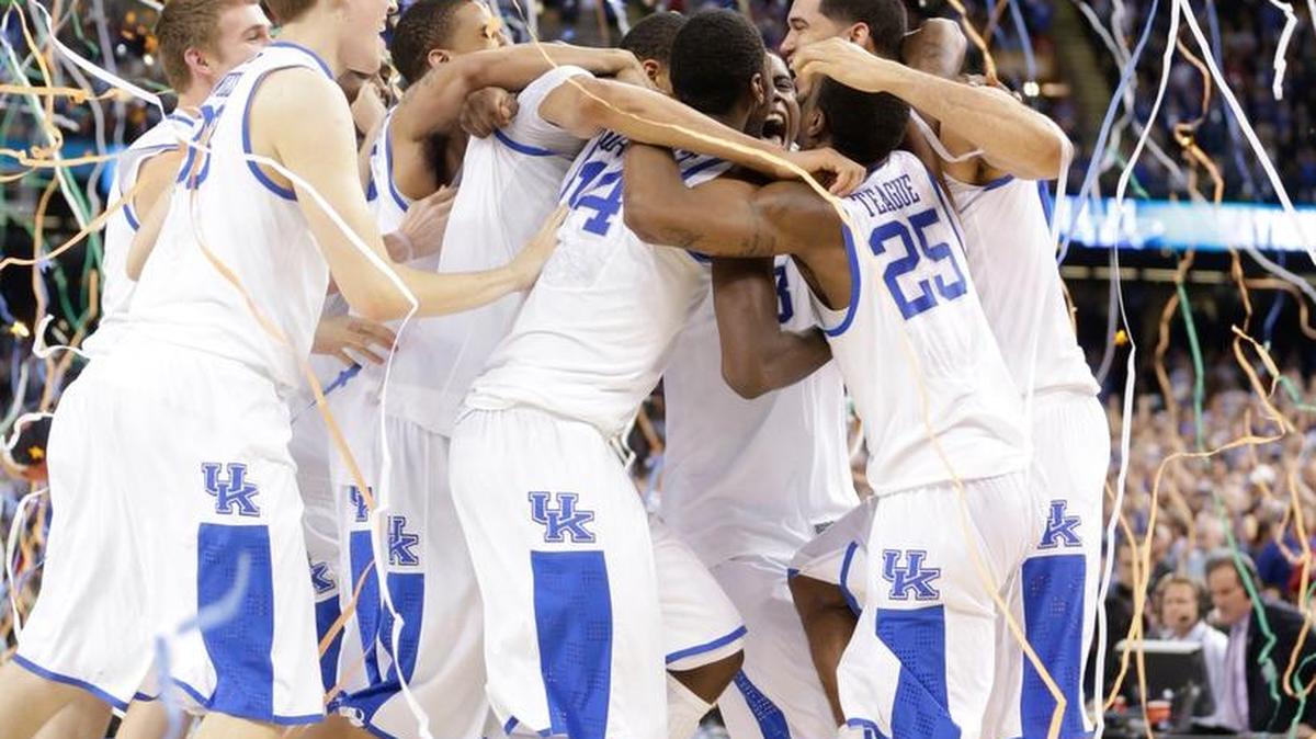UK team celebrates after defeating Kansas in the championship game of the NCAA Final Four basketball tournament Monday, April 2, 2012, in New Orleans.
