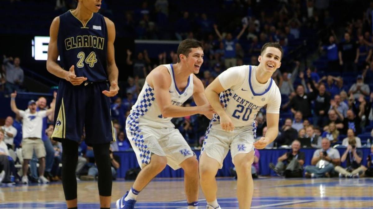 Kentucky's Brad Calipari (20) was congratulated by Jonny David (10) after a three pointer in the second half of the Clarion at Kentucky men's basketball game at Rupp Arena in Lexington, Ky, on Oct. 30, 2016. Kentucky beat Clarion 108-51.