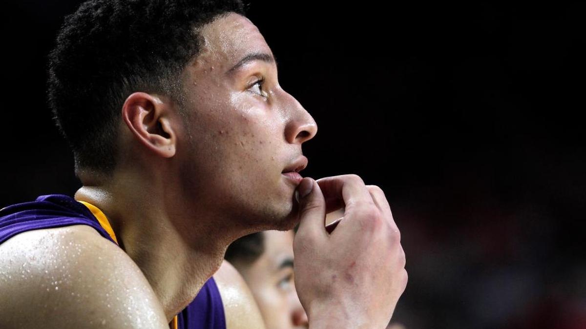 LSU's Ben Simmons watches from the bench with minutes left in an NCAA college basketball game against Arkansas, Tuesday, Feb. 23, 2016, in Fayetteville, Ark. Arkansas won 85-65. (AP Photo/Samantha Baker)