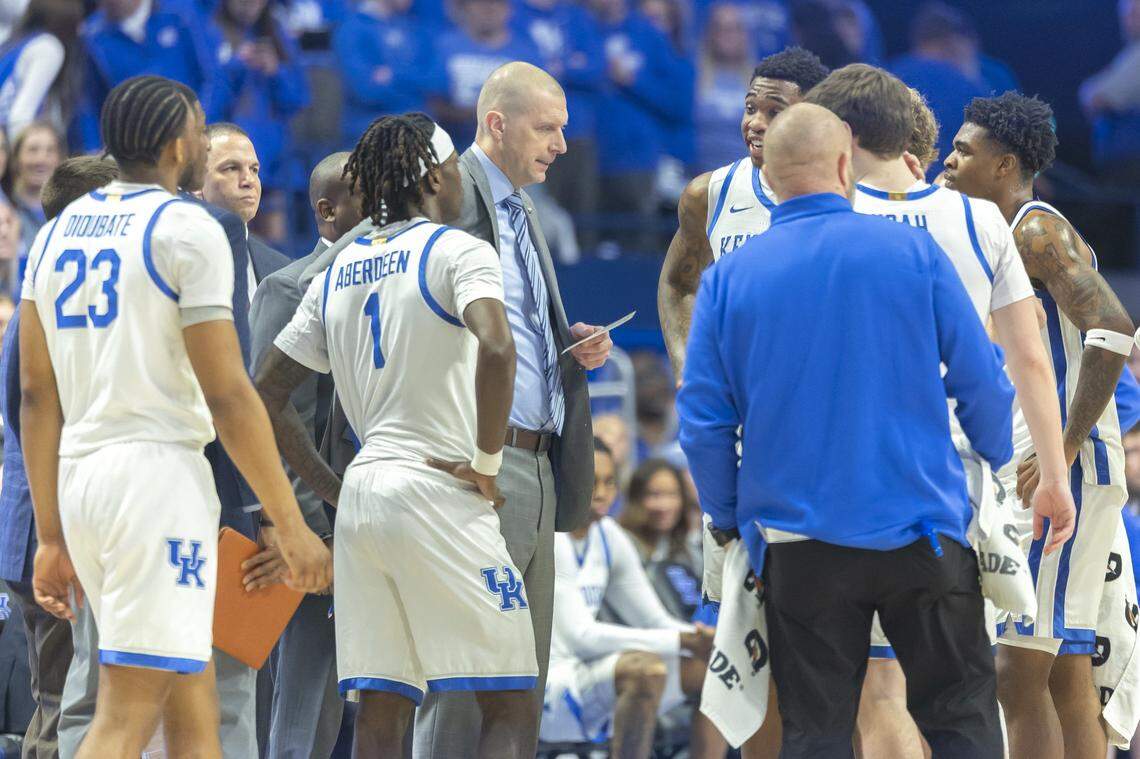 Kentucky Wildcats head coach Mark Pope talks with his team during a timeout in a game against Vanderbilt at Rupp Arena on Saturday.