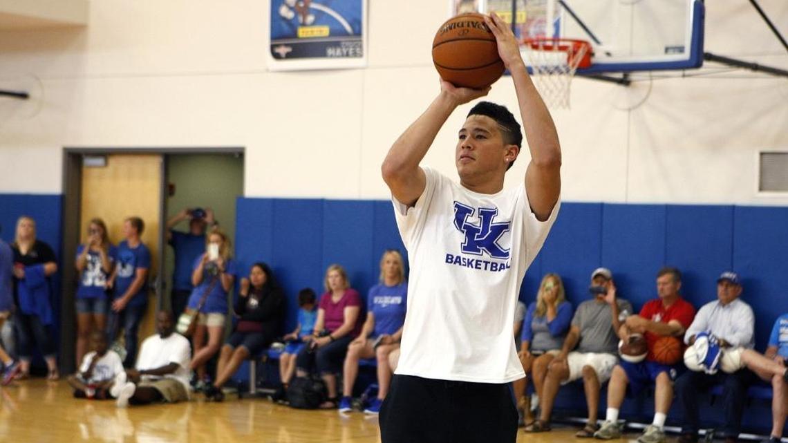 Devin Booker shoots a 3-pointer during the John Calipari Shooting Camp in the Joe Craft Center in Lexington, Ky., Saturday, July 30, 2016.