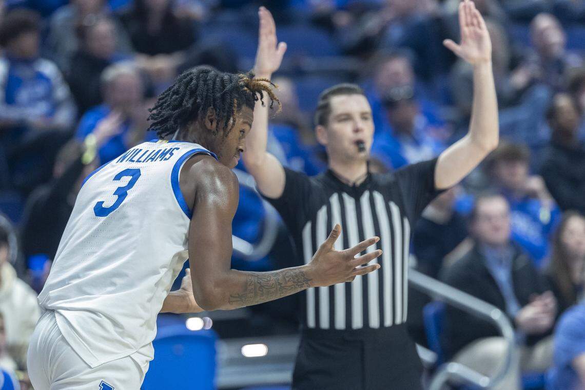 Kentucky Wildcats guard Kam Williams (3) reacts after scoring a 3-pointer during a game at Rupp Arena in Lexington, Ky., on Tuesday, Dec. 23, 2025.