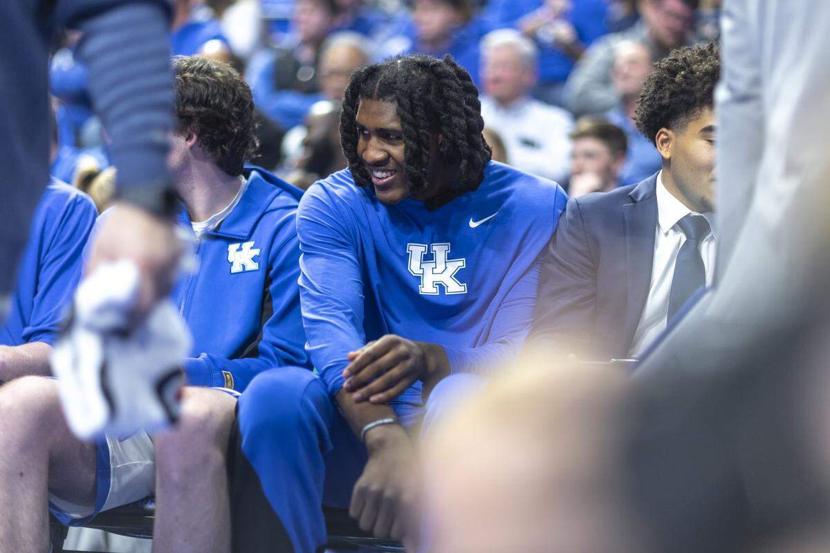 Kentucky forward Jayden Quaintance smiles as he watches his team play during a game against the North Carolina Central Eagles at Rupp Arena in Lexington, Ky., on Tuesday, Dec. 9, 2025.