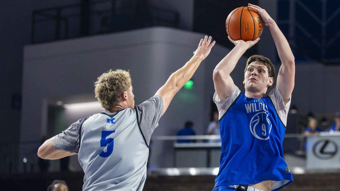 Kentucky forward Trent Noah puts up a shot over Wildcats guard Collin Chandler during the Blue-White Game in Memorial Coliseum on Oct. 17.