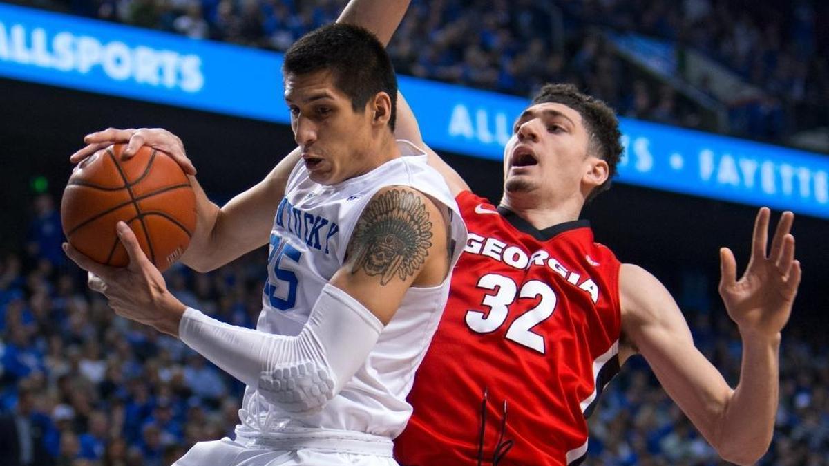 Kentucky forward Derek Willis, left, grabs a rebound from Georgia forward Mike Edwards in the first half. The University of Kentucky hosted the University of Georgia, Tuesday, Feb. 09, 2016 at Rupp Arena in Lexington .