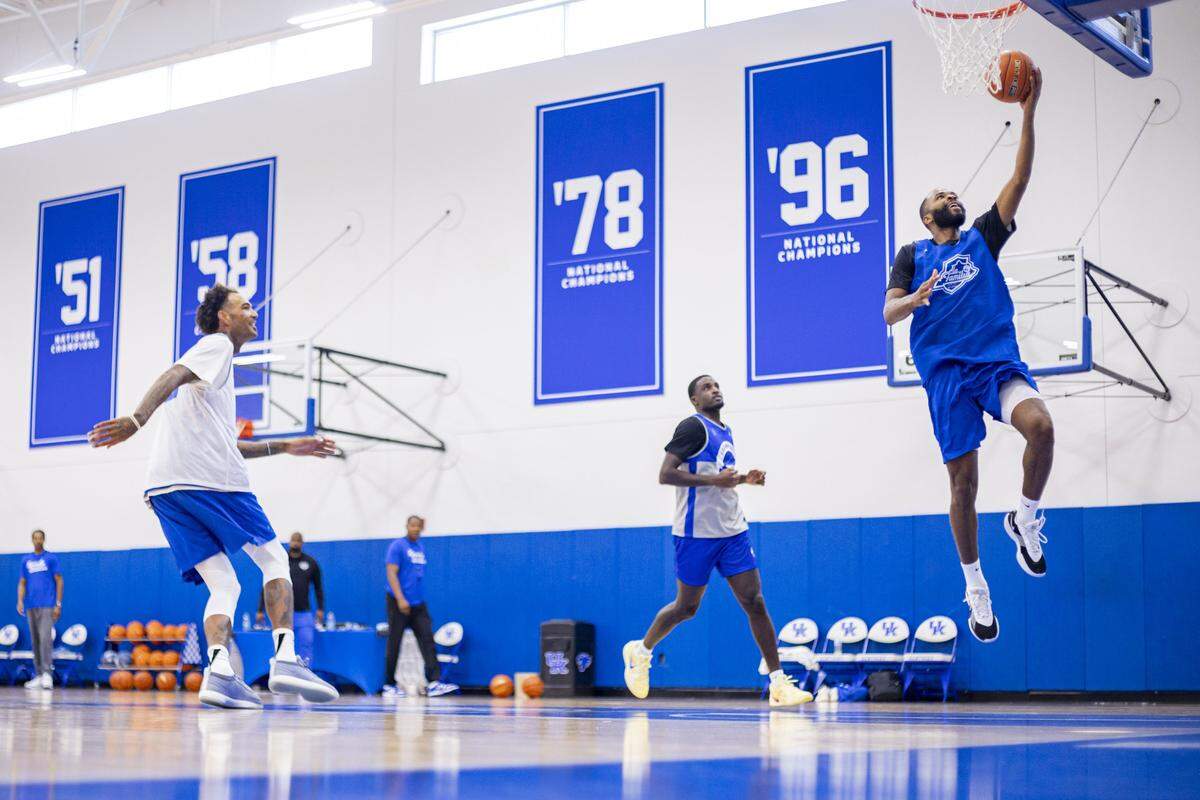 Former Kentucky player Andrew Harrison shoots a layup during a TBT practice in the Joe Craft Center in July.