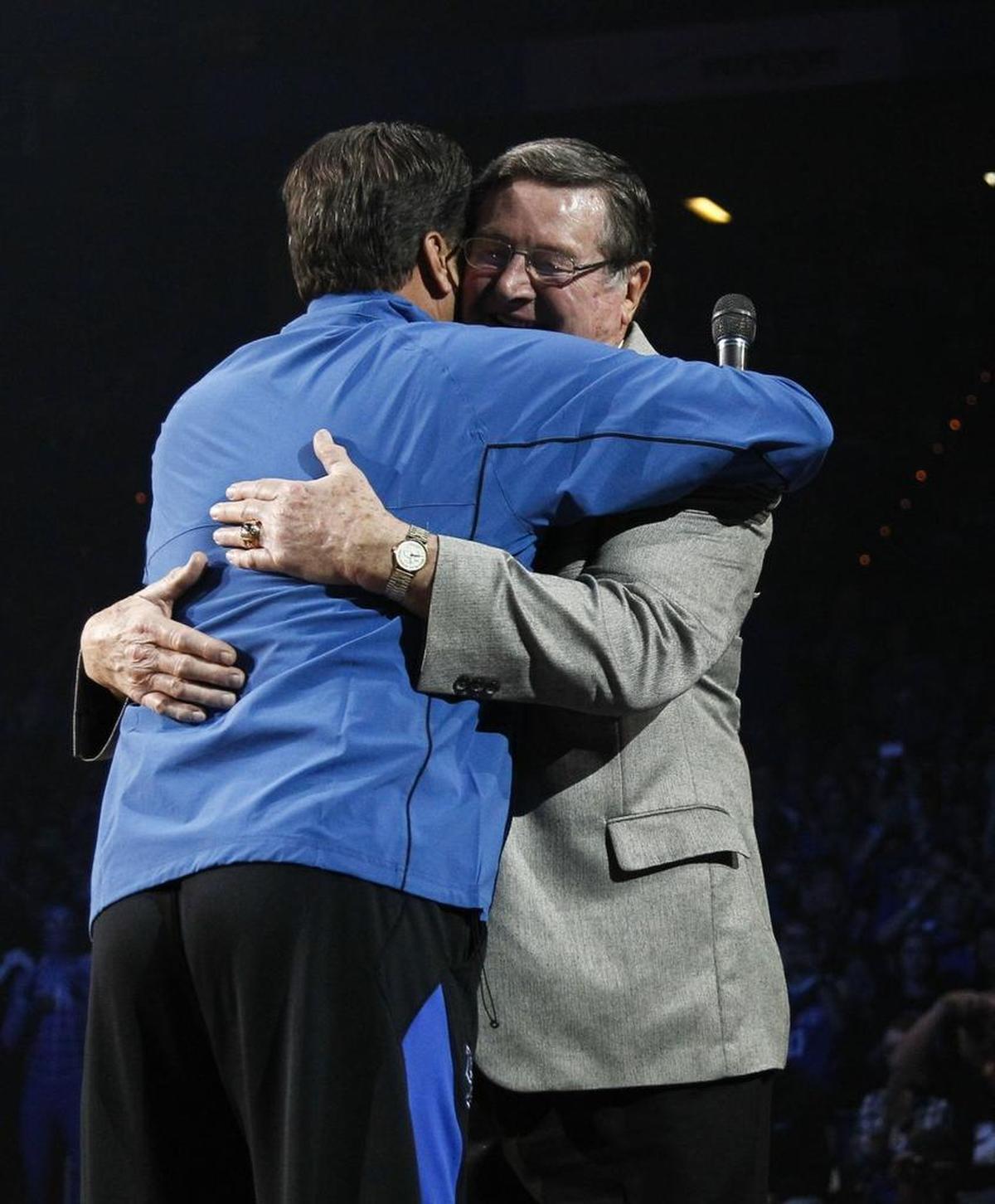 John Calipari hugged former UK coach Joe B. Hall, during Big Blue Madness in 2012.