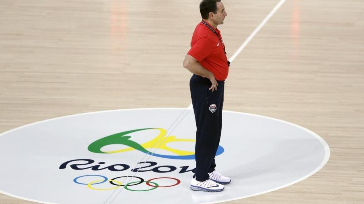 United States head coach Mike Krzyzewski watches over a basketball practice session for the 2016 Summer Olympics in Rio de Janeiro, Brazil, Thursday, Aug. 4, 2016.