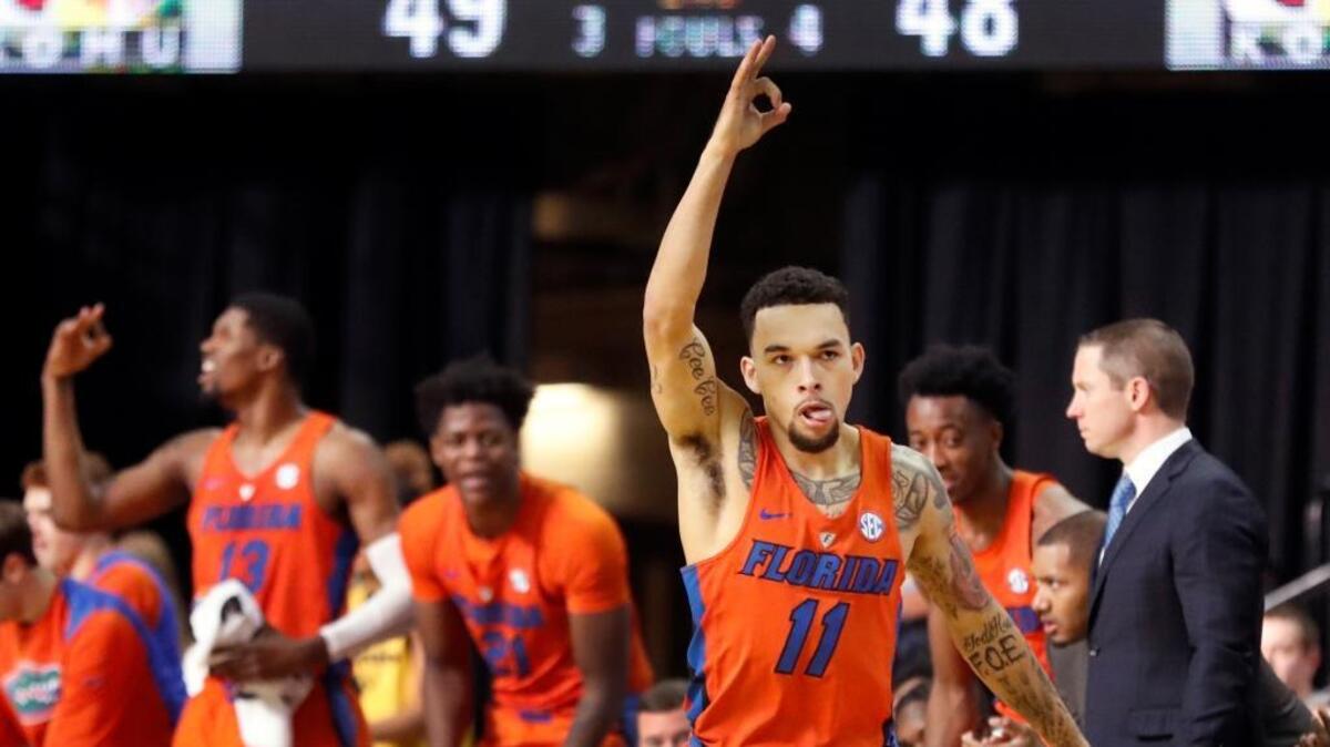 Florida’s Chris Chiozza (11) celebrated after making a three-point basket against Missouri on Jan. 6.