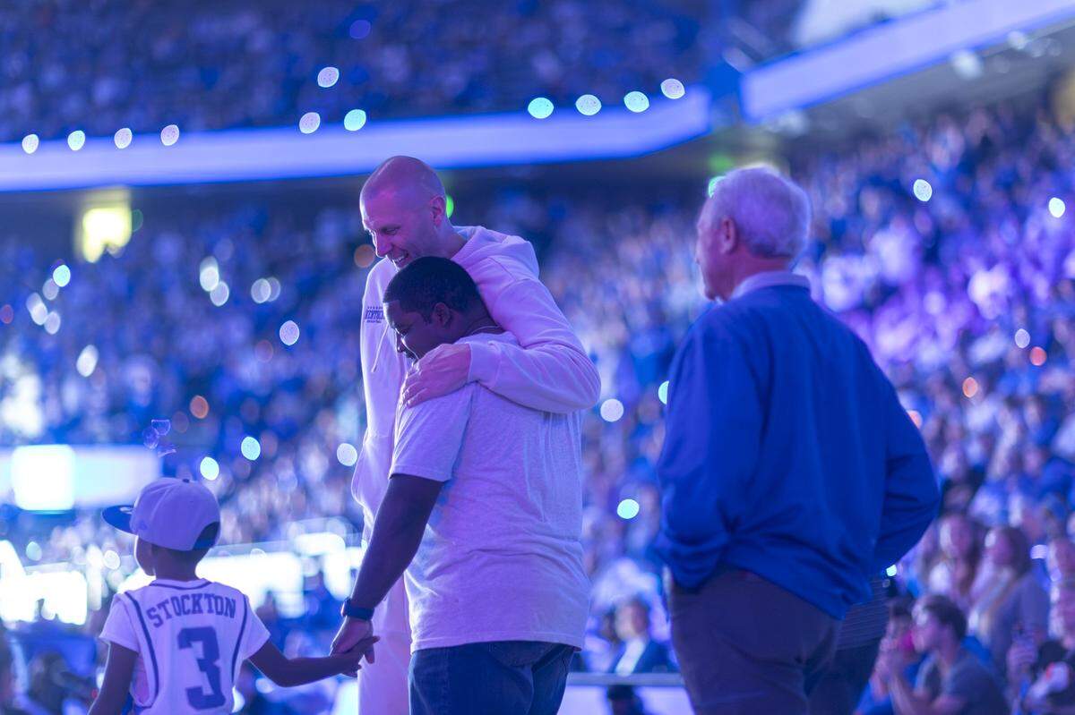 Kentucky Wildcats head coach Mark Pope greets former players and family Saturday during Big Blue Madness at Rupp Arena