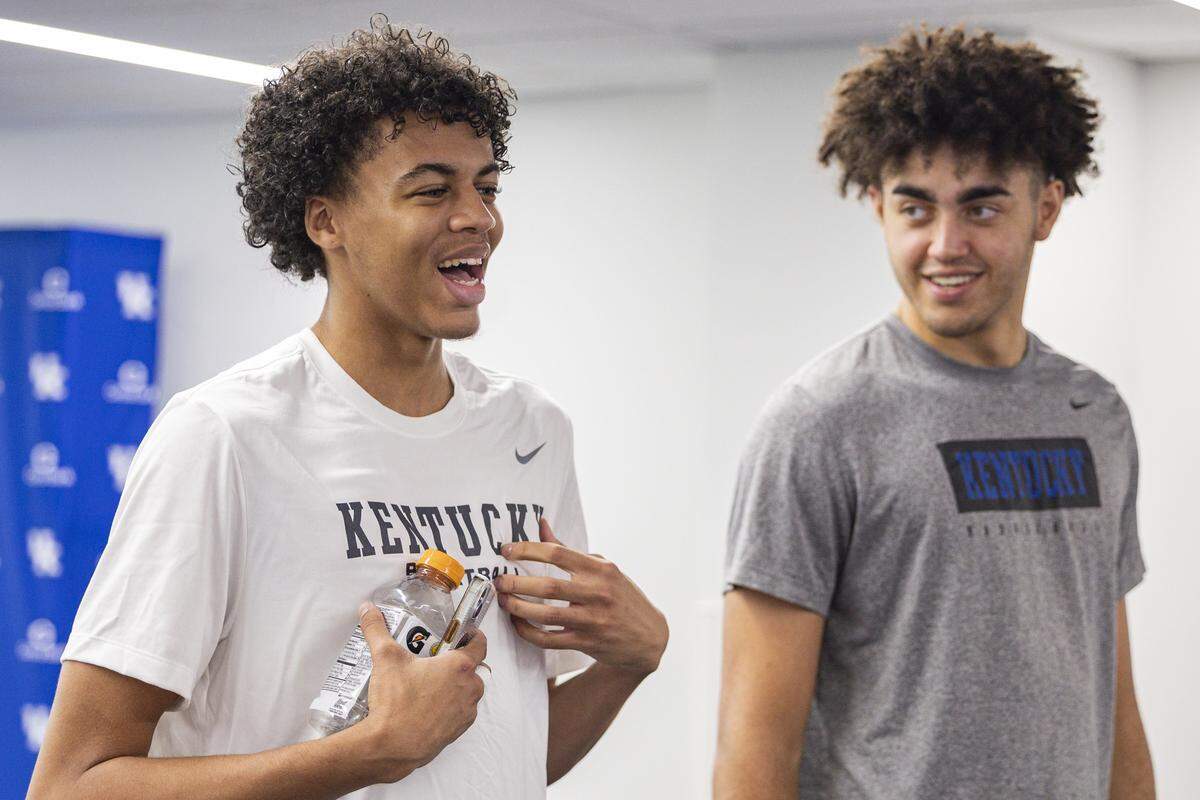 Kentucky forward Braydon Hawthorne, left, and Malachi Moreno joke around with fellow freshman Jasper Johnson during a media availability in the preseason.