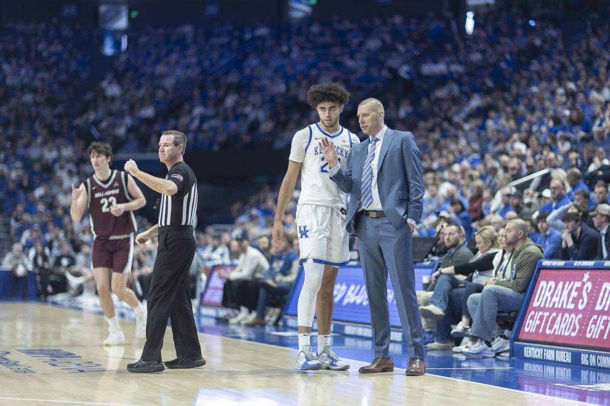 Kentucky head coach Mark Pope talks with Wildcats center Malachi Moreno (24) during a game against Bellarmine at Rupp Arena Dec. 23, 2025.